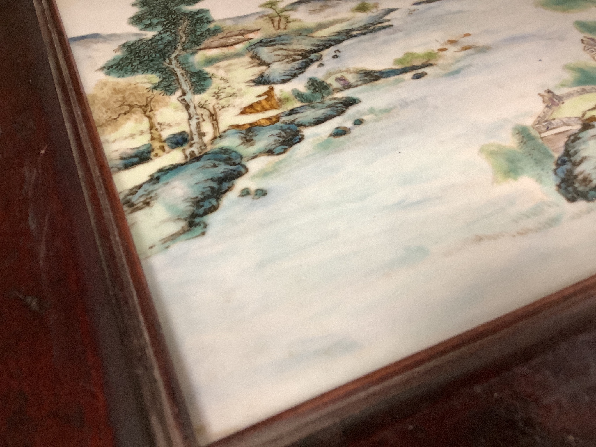 A Chinese enamelled porcelain plaque, in hardwood frame, 27 x 41cm excl. frame